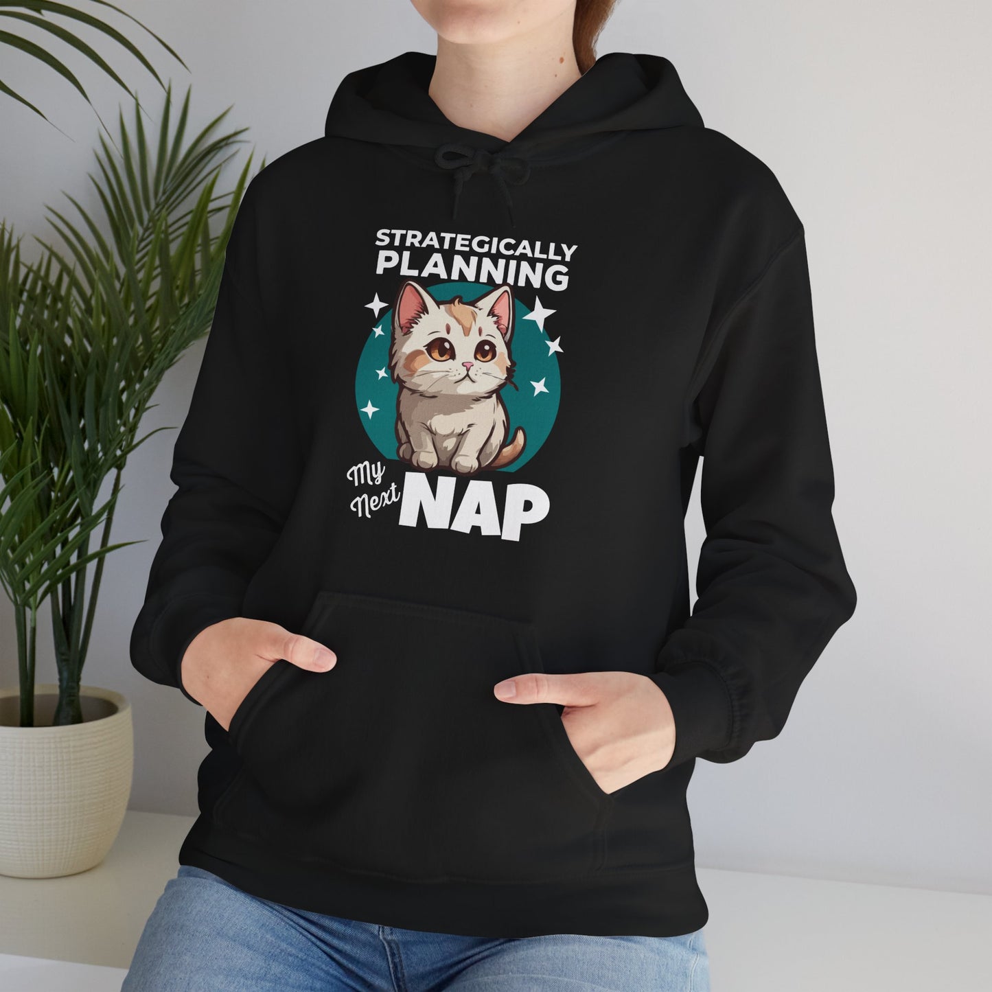 “Strategically Planning My Next Nap” Funny Cat Hoodie – Lazy Cat Lover Gift, Cozy Unisex Pullover for Pet Parents, Nap Queens & Introverts