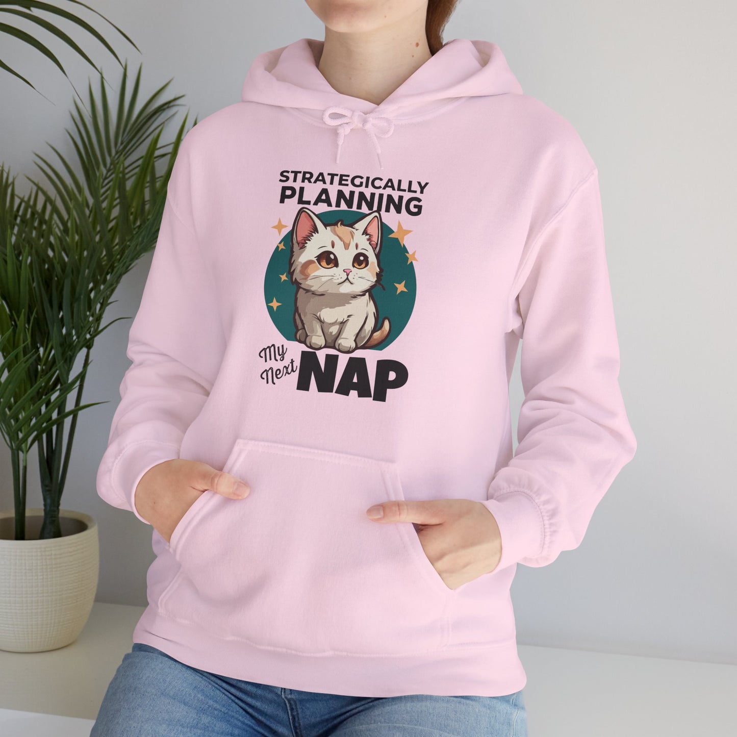 “Strategically Planning My Next Nap” Funny Cat Hoodie – Lazy Cat Lover Gift, Cozy Unisex Pullover for Pet Parents, Nap Queens & Introverts