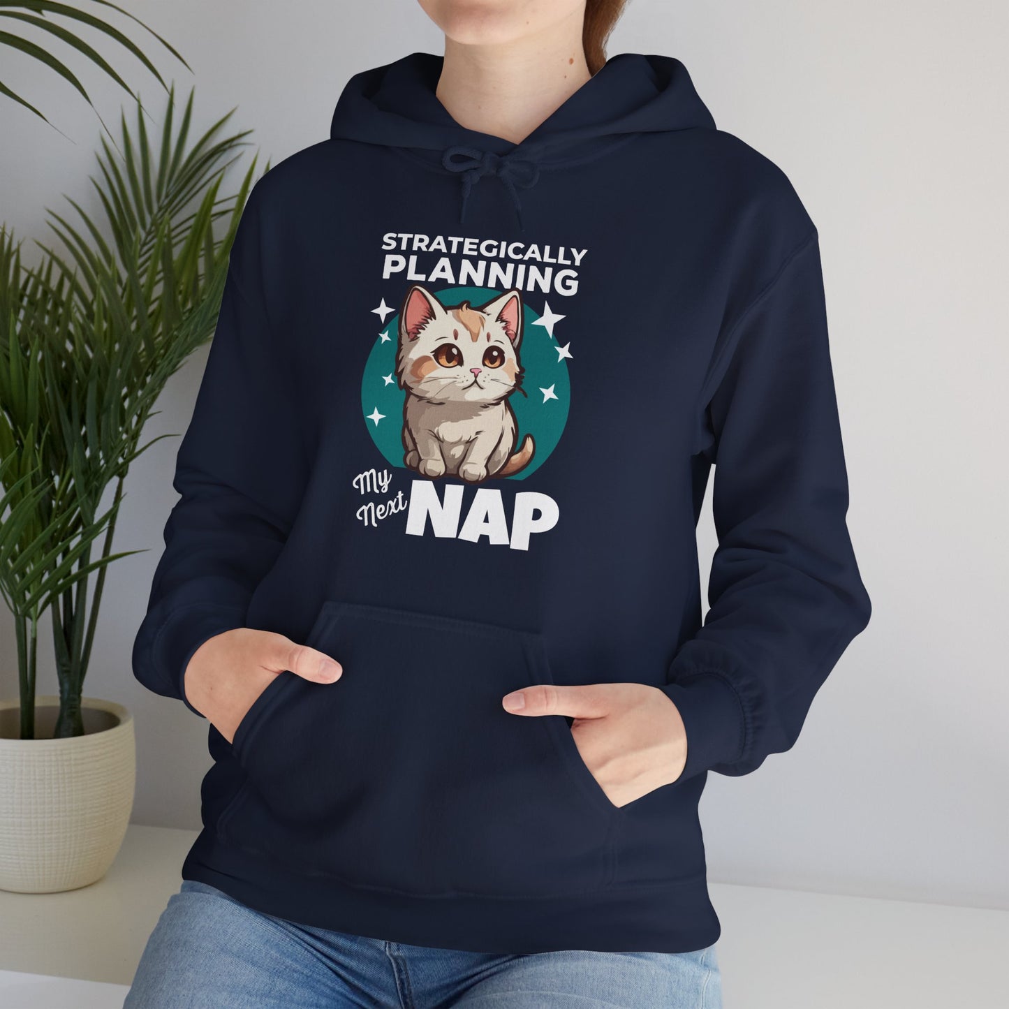 “Strategically Planning My Next Nap” Funny Cat Hoodie – Lazy Cat Lover Gift, Cozy Unisex Pullover for Pet Parents, Nap Queens & Introverts