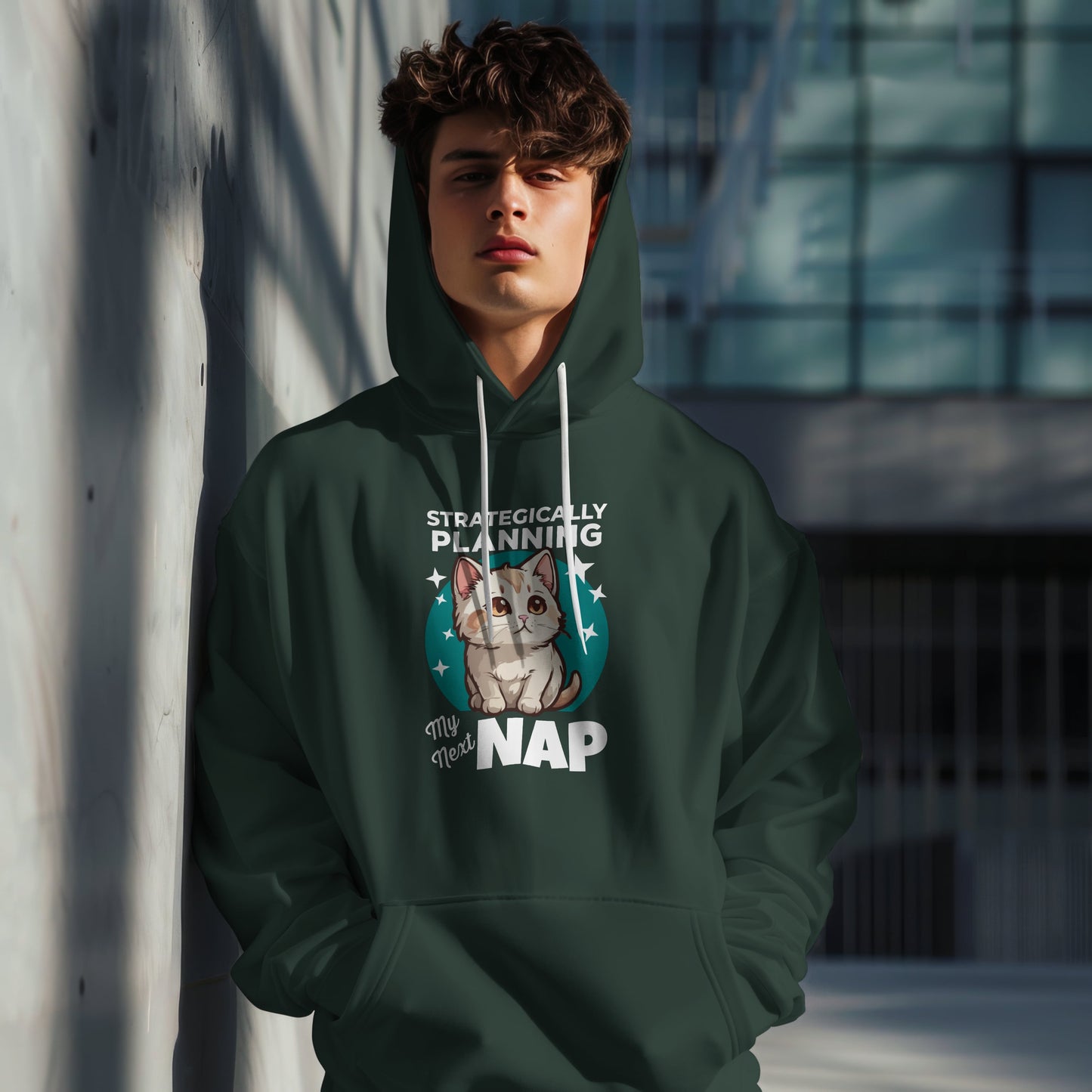 “Strategically Planning My Next Nap” Funny Cat Hoodie – Lazy Cat Lover Gift, Cozy Unisex Pullover for Pet Parents, Nap Queens & Introverts
