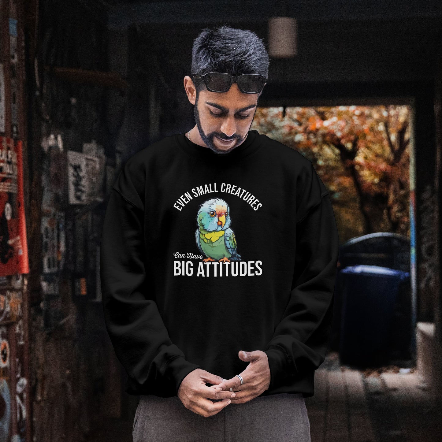 “Even Small Creatures Can Have Big Attitude” Parrot Sweatshirt – Sassy Bird Lover Gift, Bold Animal Graphic for Pet Owners