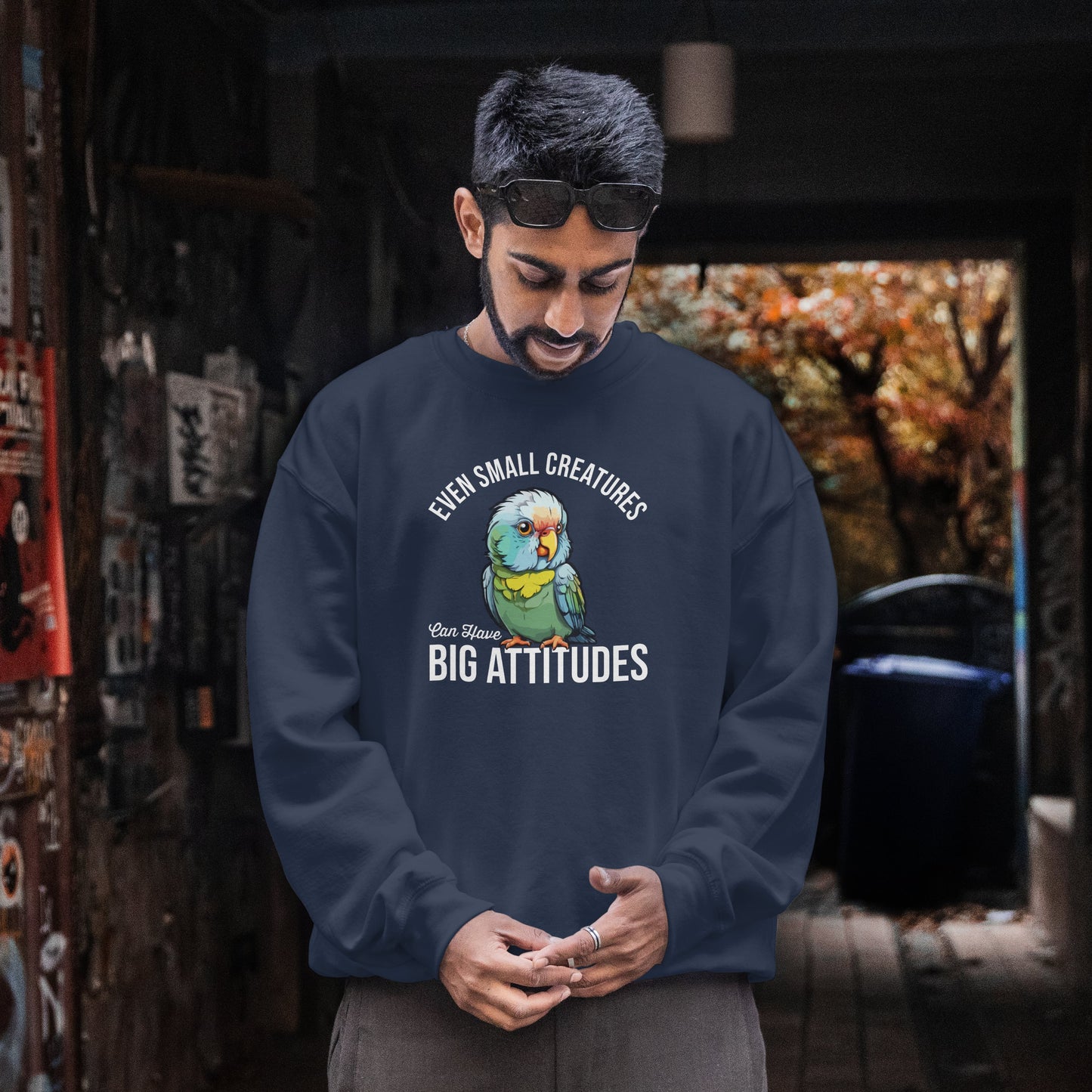 “Even Small Creatures Can Have Big Attitude” Parrot Sweatshirt – Sassy Bird Lover Gift, Bold Animal Graphic for Pet Owners