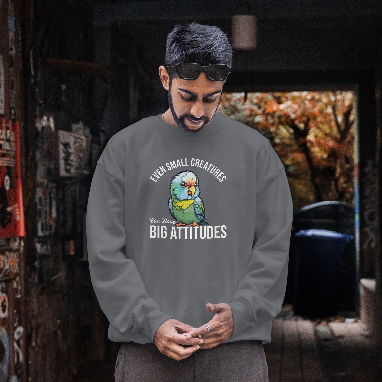 “Even Small Creatures Can Have Big Attitude” Parrot Sweatshirt – Sassy Bird Lover Gift, Bold Animal Graphic for Pet Owners