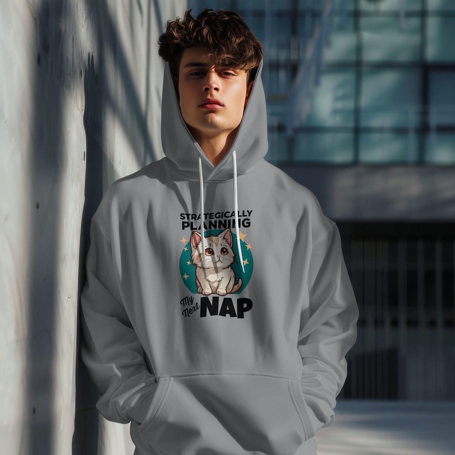 “Strategically Planning My Next Nap” Funny Cat Hoodie – Lazy Cat Lover Gift, Cozy Unisex Pullover for Pet Parents, Nap Queens & Introverts