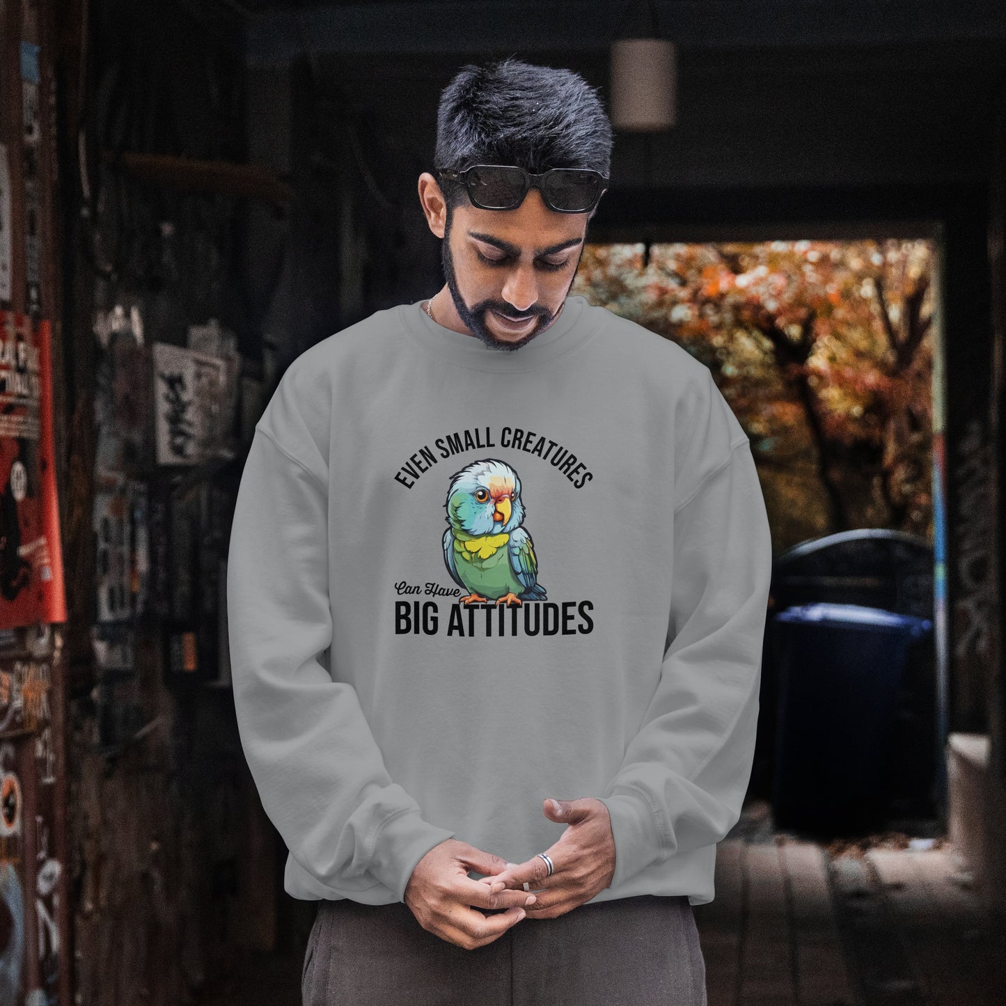 “Even Small Creatures Can Have Big Attitude” Parrot Sweatshirt – Sassy Bird Lover Gift, Bold Animal Graphic for Pet Owners